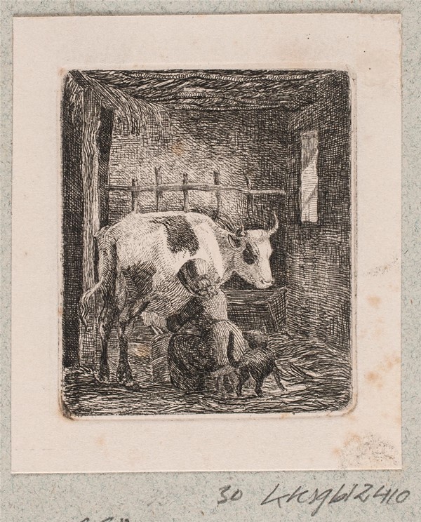 En pige malker en ko